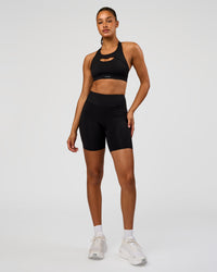 Woman wearing LimitLift Sports Bra - Black | Model:Rosie | Size:S | Thumbnail Index: 3
