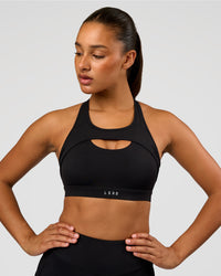 Woman wearing LimitLift Sports Bra - Black | Model:Rosie | Size:S | Thumbnail Index: 2
