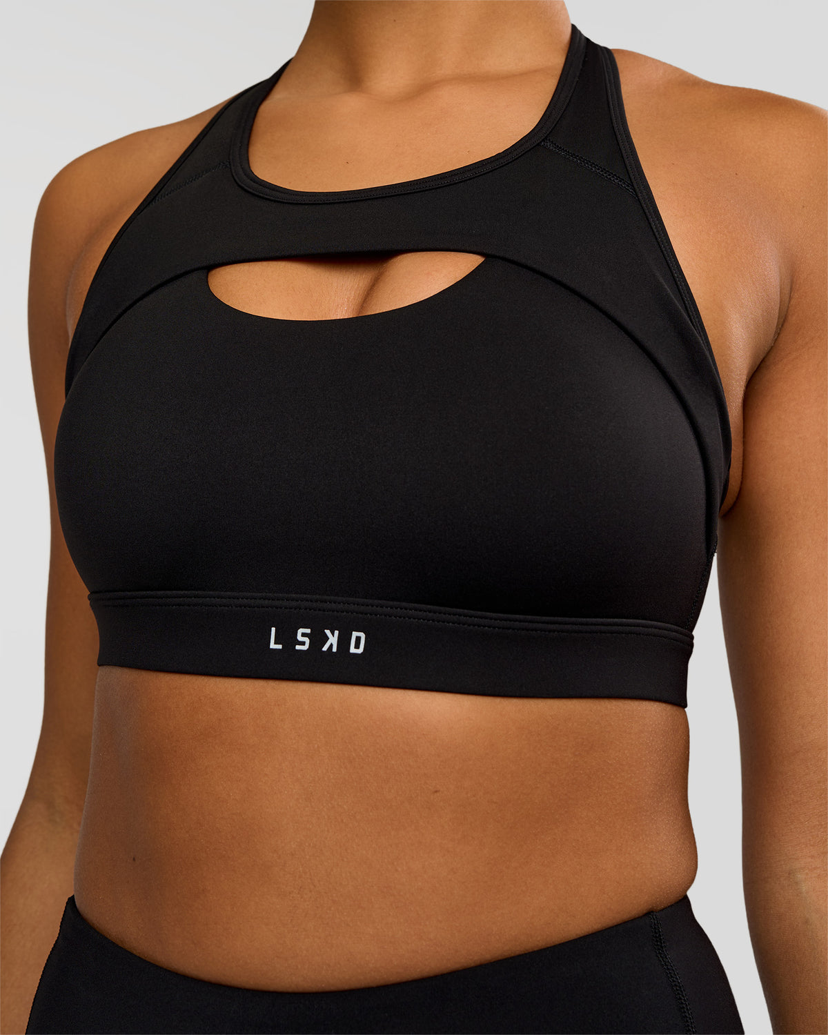 Woman wearing LimitLift Sports Bra - Black | Model:Rosie | Size:S