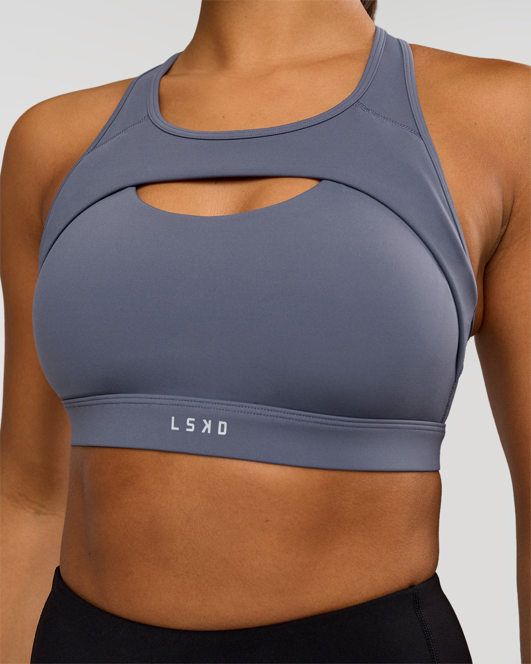 Woman wearing LimitLift Sports Bra - Night Shadow | Model:Rosie | Size:S - view 1