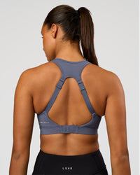 Woman wearing LimitLift Sports Bra - Night Shadow | Model:Rosie | Size:S | Thumbnail Index: 2