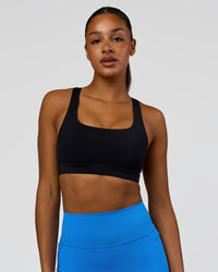 Model wearing Limitless Sports Bra - Black | Model:Rosie | Size:S | Thumbnail Index: 0