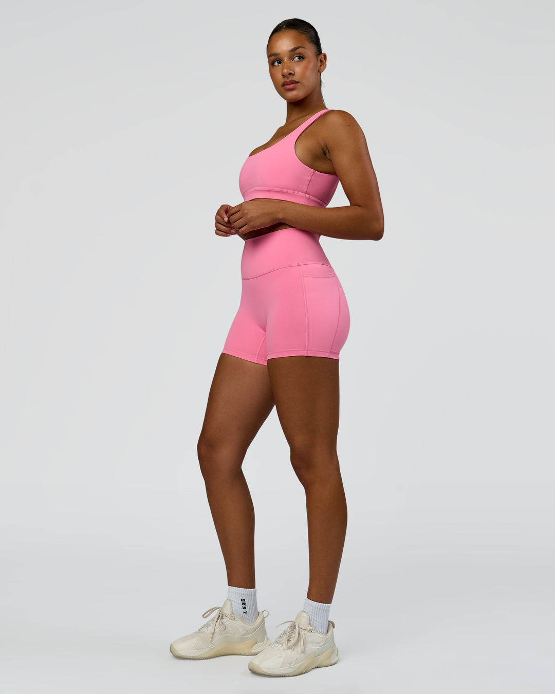 Model wearing Limitless Sports Bra - Candy Pink | Model:Rosie | Size:S - view 4