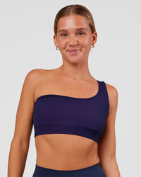 Woman wearing Lively Seamless Ribbed Sports Bra - Future Navy-Ultra Fuchsia | Model:Amity | Size:S | Thumbnail Index: 0