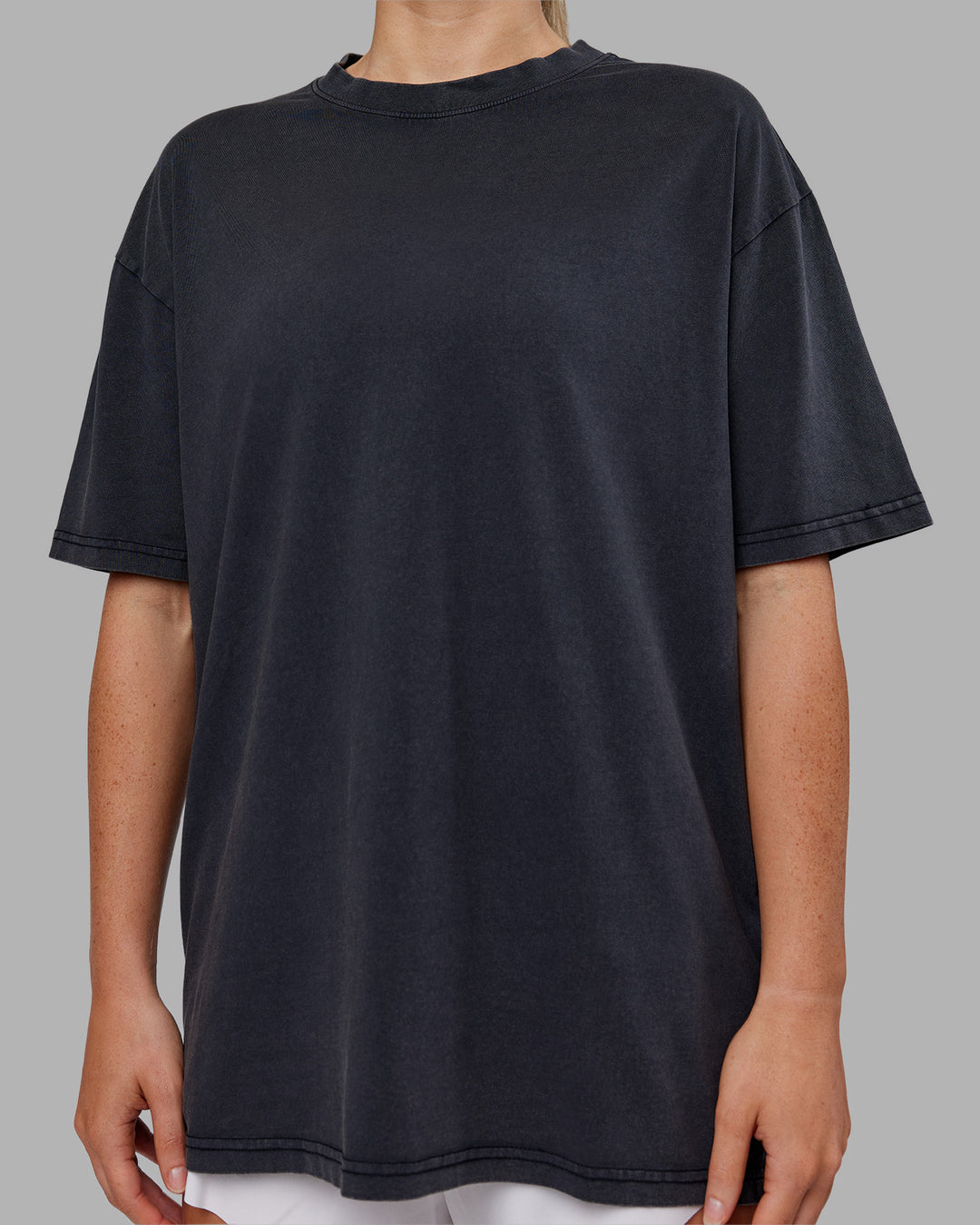 Woman wearing Love The Run FLXCotton Tee Oversize - Black Washed-Circular Grey | Model:Neve | Size:S - view 11