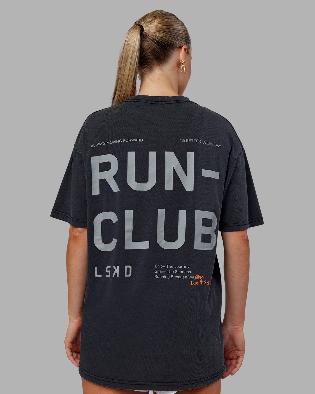 Woman wearing Love The Run FLXCotton Tee Oversize - Black Washed-Circular Grey | Model:Neve | Size:S - view 7