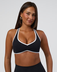 Woman wearing Luminous Sports Bra - Black-White | Model:Bianca | Size:S | Thumbnail Index: 0