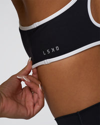 Woman wearing Luminous Sports Bra - Black-White | Model:Bianca | Size:S | Thumbnail Index: 3