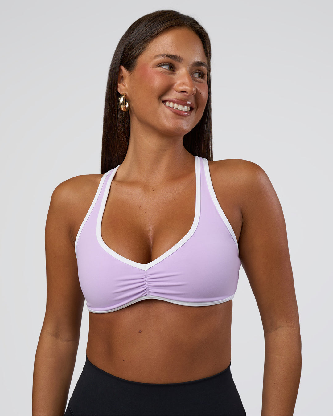 Woman wearing Luminous Sports Bra - Pale Lilac-White | Model:Bianca | Size:S - view 3