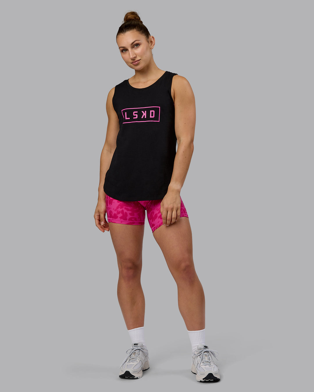 Woman wearing Luna FLXCotton Longline Tank - Black-Ultra Pink - view 7