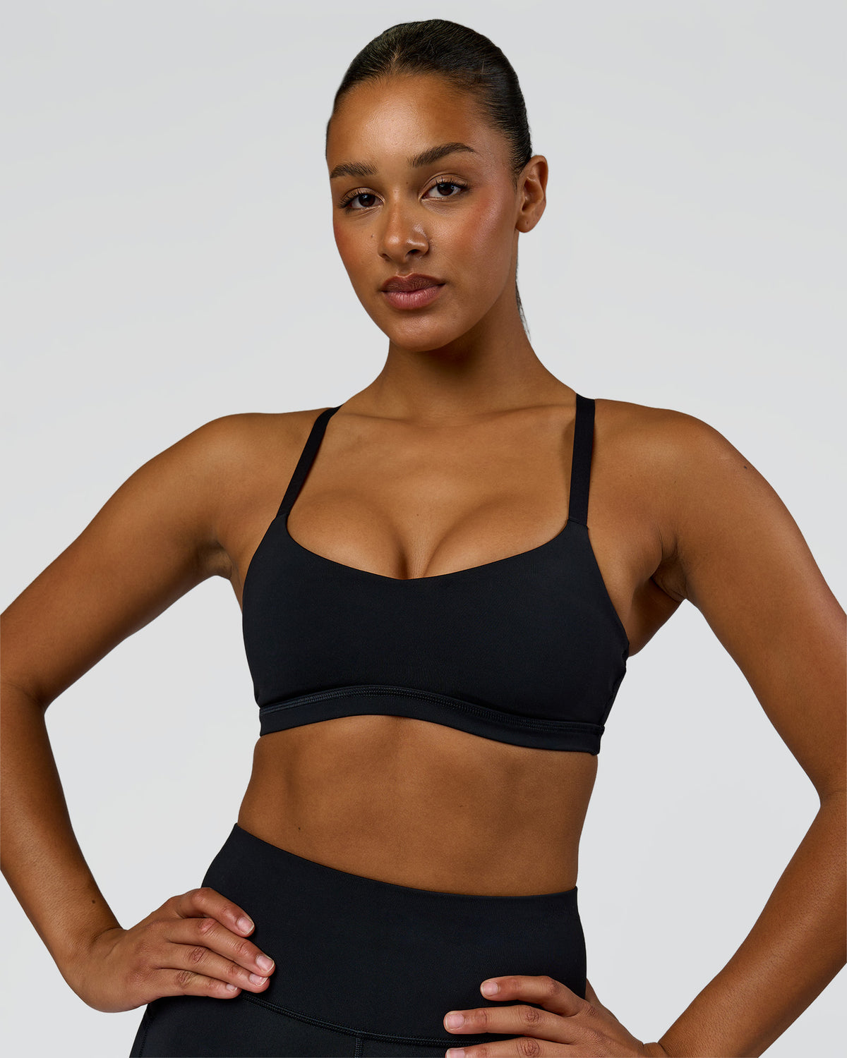 Woman wearing Luna Sports Bra - Black | Model:Rosie | Size:S