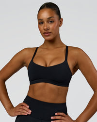 Woman wearing Luna Sports Bra - Black | Model:Rosie | Size:S | Thumbnail Index: 0