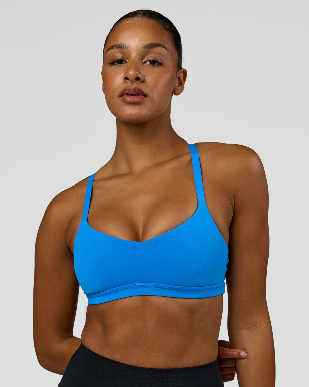 Woman wearing Luna Sports Bra - Palace Blue | Model:Rosie | Size:S - view 2