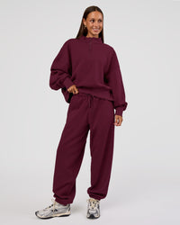 Woman wearing MVP 1/2 Zip Oversized Sweater - Cherry Lacquer | Model:Brylee | Size:S | Thumbnail Index: 4