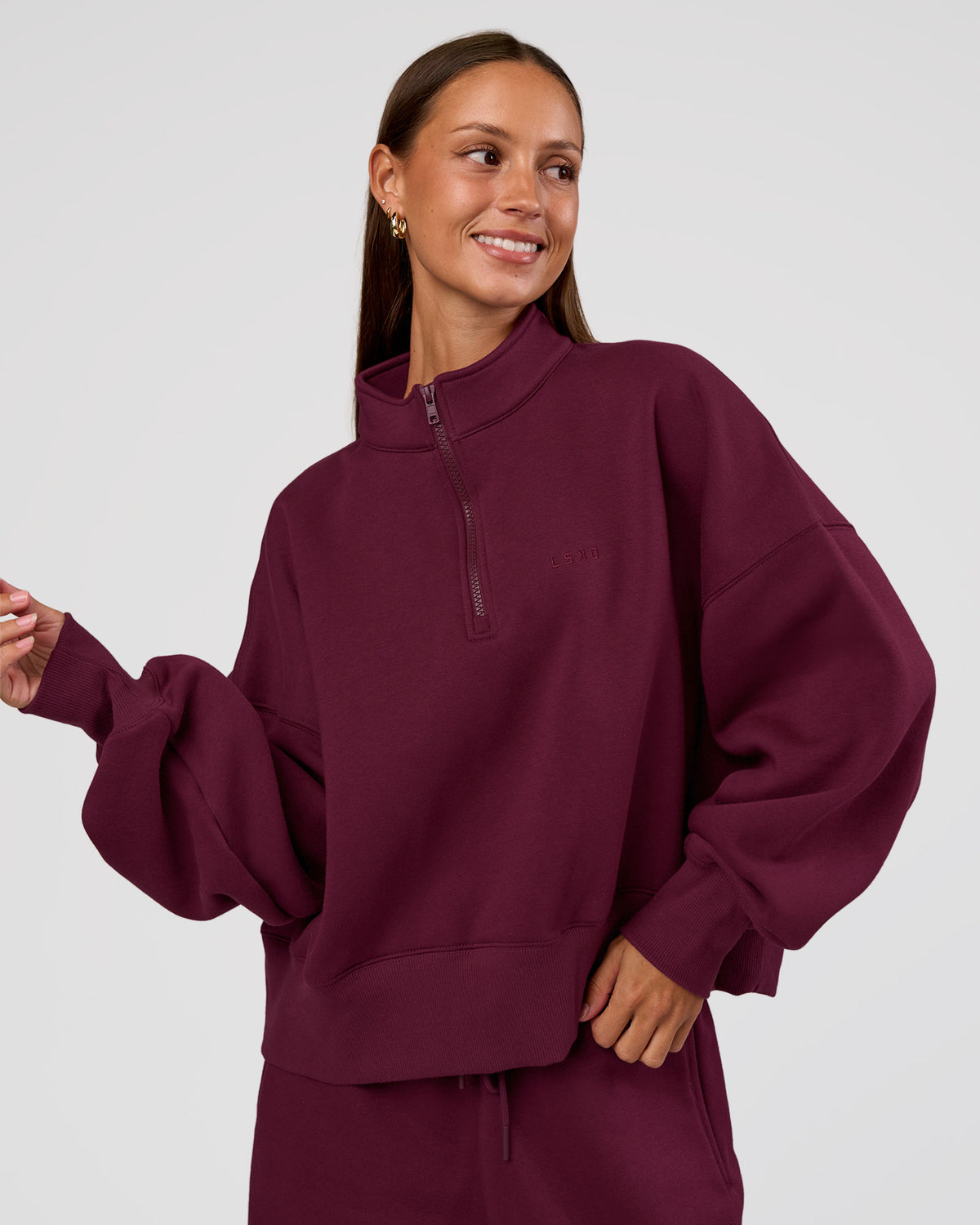 Woman wearing MVP 1/2 Zip Oversized Sweater - Cherry Lacquer | Model:Brylee | Size:S