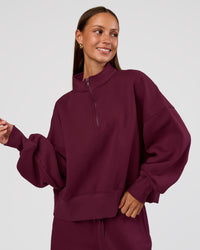 Woman wearing MVP 1/2 Zip Oversized Sweater - Cherry Lacquer | Model:Brylee | Size:S | Thumbnail Index: 0