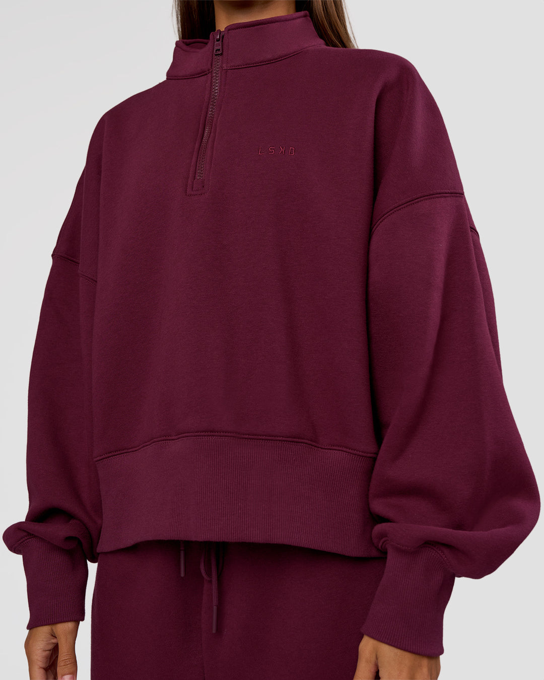 Woman wearing MVP 1/2 Zip Oversized Sweater - Cherry Lacquer | Model:Brylee | Size:S - view 6