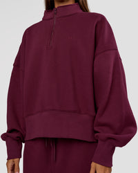 Woman wearing MVP 1/2 Zip Oversized Sweater - Cherry Lacquer | Model:Brylee | Size:S | Thumbnail Index: 5
