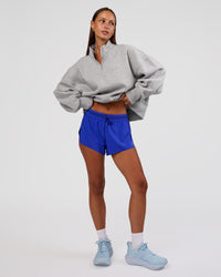 Woman wearing MVP 1/2 Zip Oversized Sweater - Light Grey Marl | Model:Brylee | Size:S | Thumbnail Index: 1
