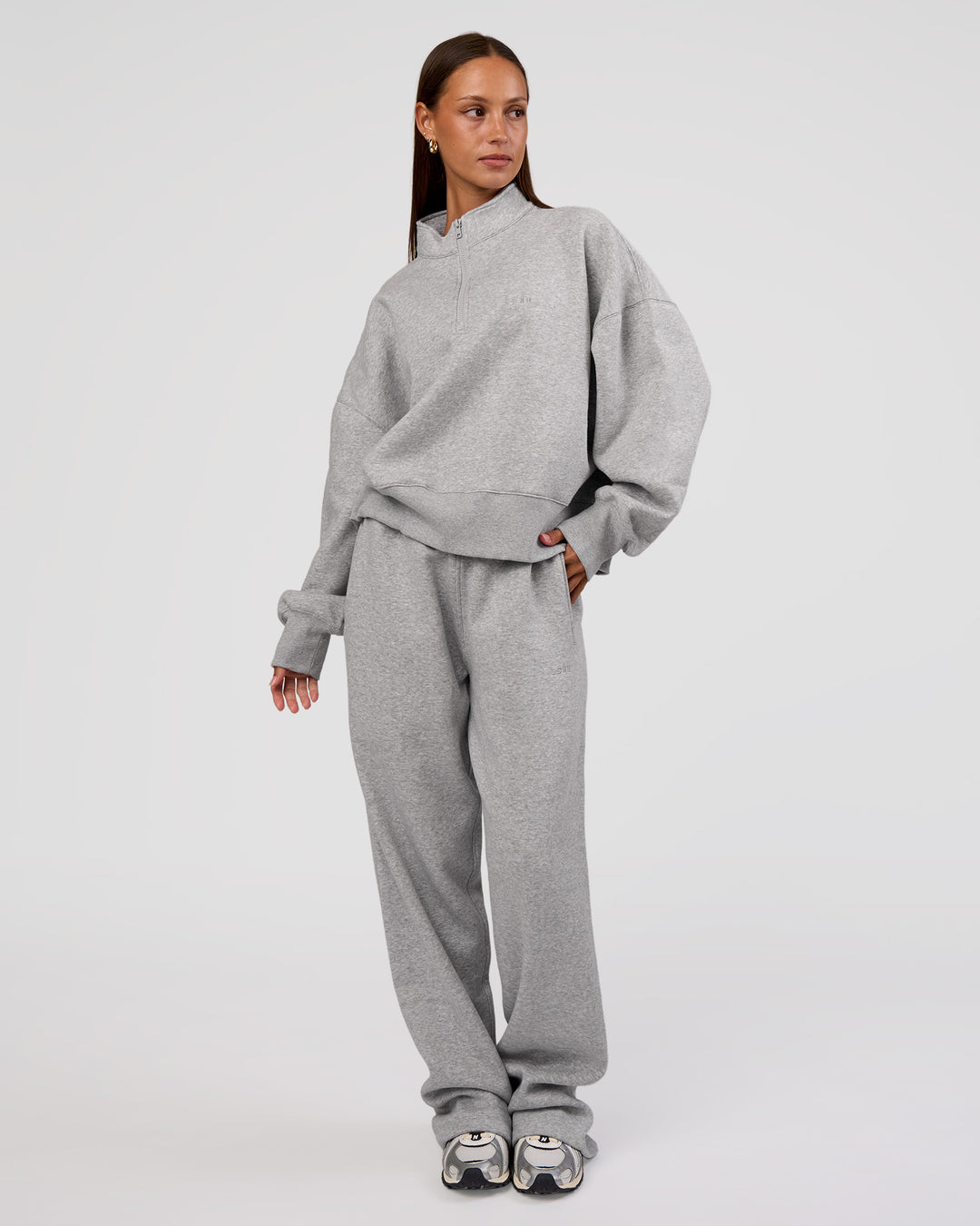 Woman wearing MVP 1/2 Zip Oversized Sweater - Light Grey Marl | Model:Brylee | Size:S - view 3