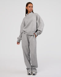 Woman wearing MVP 1/2 Zip Oversized Sweater - Light Grey Marl | Model:Brylee | Size:S | Thumbnail Index: 2