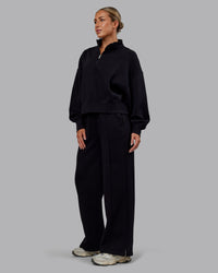 Woman wearing MVP 1/2 Zip Oversized Sweater - Black | Model:Paris | Size:S | Thumbnail Index: 4