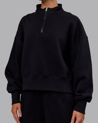 Woman wearing MVP 1/2 Zip Oversized Sweater - Black | Model:Paris | Size:S | Thumbnail Index: 3