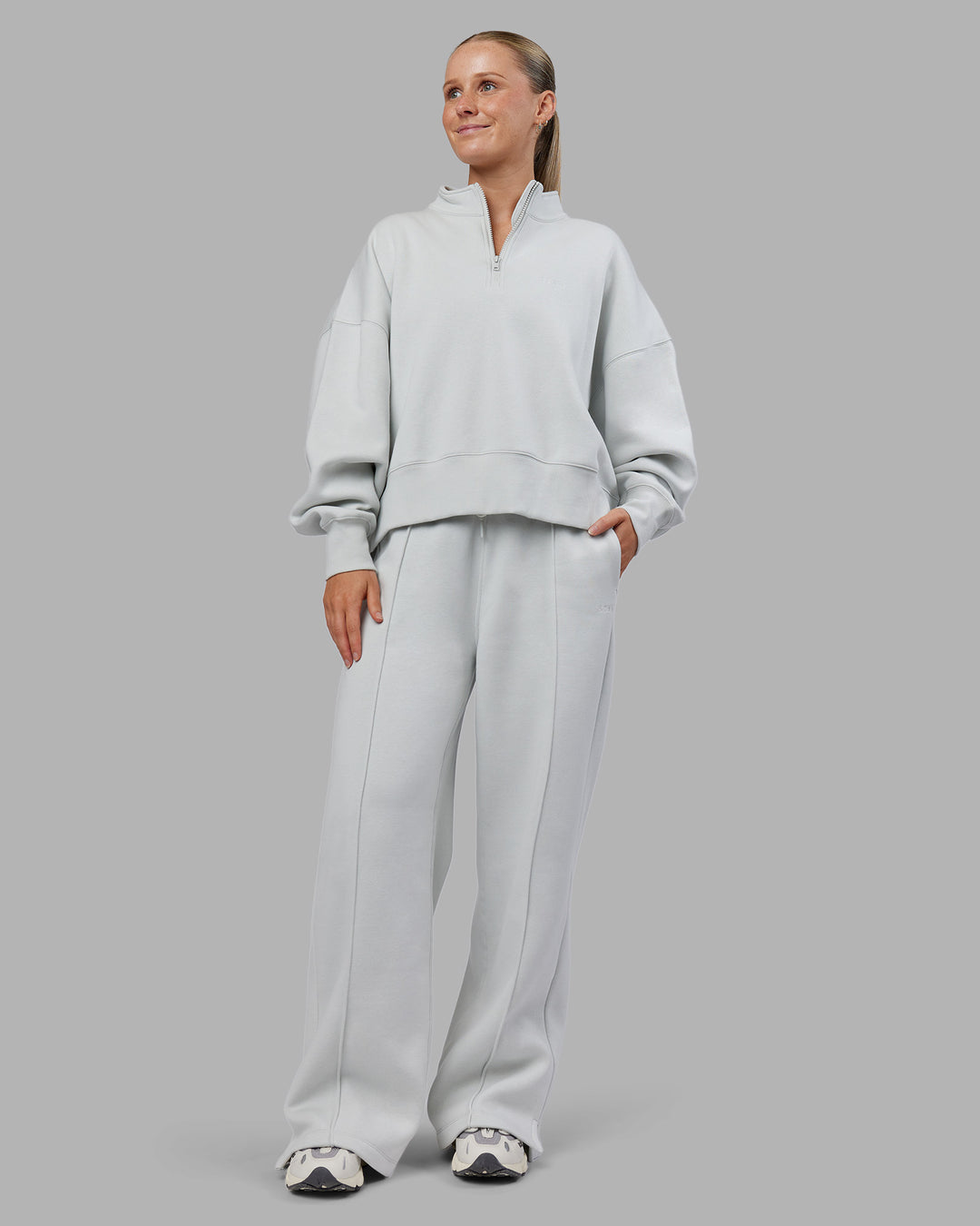 Woman wearing MVP 1/2 Zip Oversized Sweater - Digital Mist | Model:Neve | Size:S - view 1