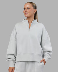 Woman wearing MVP 1/2 Zip Oversized Sweater - Digital Mist | Model:Neve | Size:S | Thumbnail Index: 1