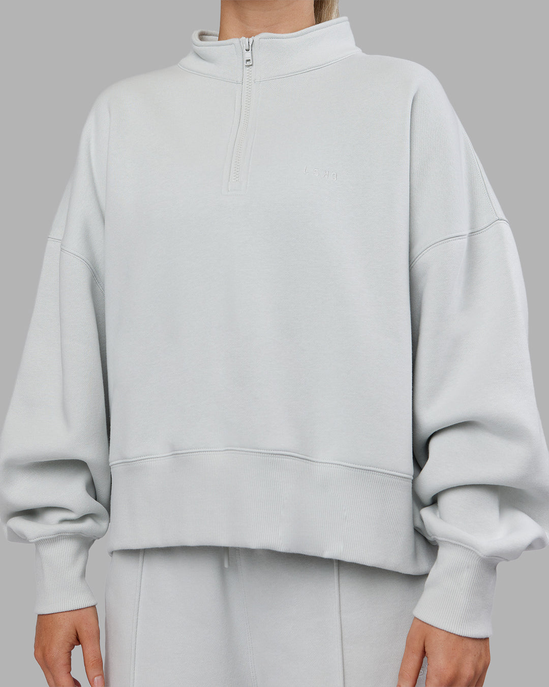 Woman wearing MVP 1/2 Zip Oversized Sweater - Digital Mist | Model:Neve | Size:S - view 6