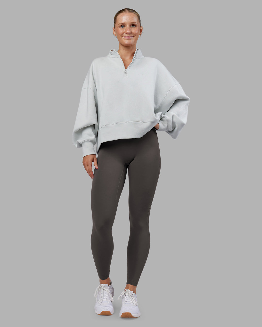Woman wearing MVP 1/2 Zip Oversized Sweater - Digital Mist | Model:Neve | Size:S - view 7