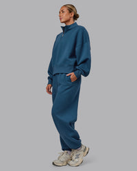 Woman wearing MVP 1/2 Zip Oversized Sweater - Indigo | Model:Paris | Size:S | Thumbnail Index: 4