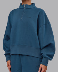 Woman wearing MVP 1/2 Zip Oversized Sweater - Indigo | Model:Paris | Size:S | Thumbnail Index: 2