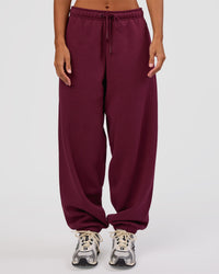 Woman wearing MVP Oversized Slouchy Fit Track Pant - Cherry Lacquer | Model:Brylee | Size:S | Thumbnail Index: 5