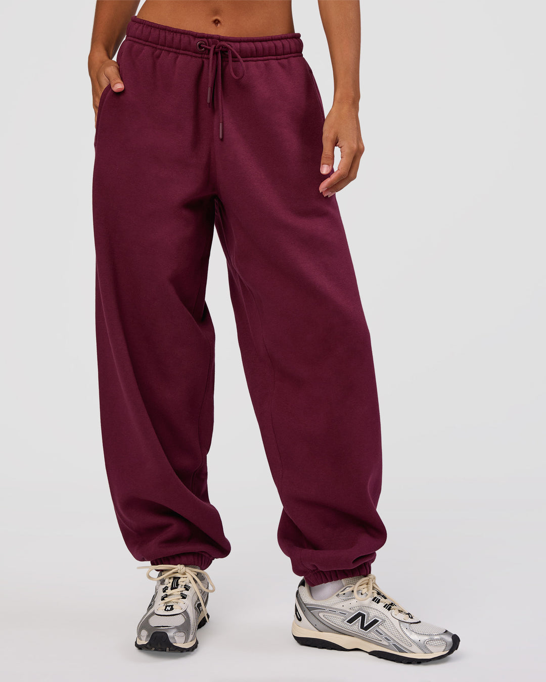 Woman wearing MVP Oversized Slouchy Fit Track Pant - Cherry Lacquer | Model:Brylee | Size:S - view 1
