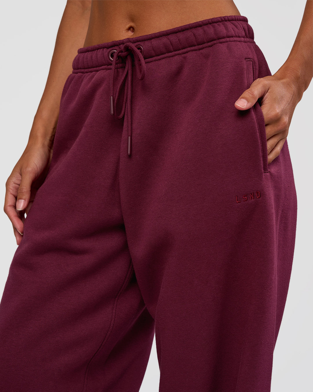 Woman wearing MVP Oversized Slouchy Fit Track Pant - Cherry Lacquer | Model:Brylee | Size:S - view 3