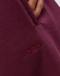 Woman wearing MVP Oversized Slouchy Fit Track Pant - Cherry Lacquer | Model:Brylee | Size:S | Thumbnail Index: 6