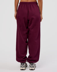 Woman wearing MVP Oversized Slouchy Fit Track Pant - Cherry Lacquer | Model:Brylee | Size:S | Thumbnail Index: 3