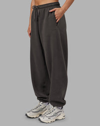 Woman wearing MVP Oversized Slouchy Fit Track Pant - Dark Storm | Model:Neve | Size:S | Thumbnail Index: 0