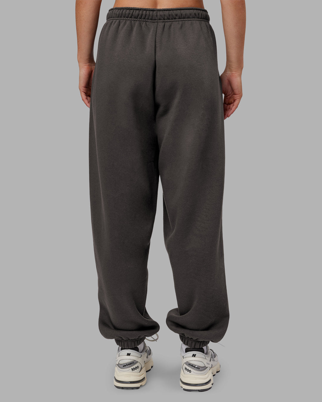 Woman wearing MVP Oversized Slouchy Fit Track Pant - Dark Storm | Model:Neve | Size:S - view 4