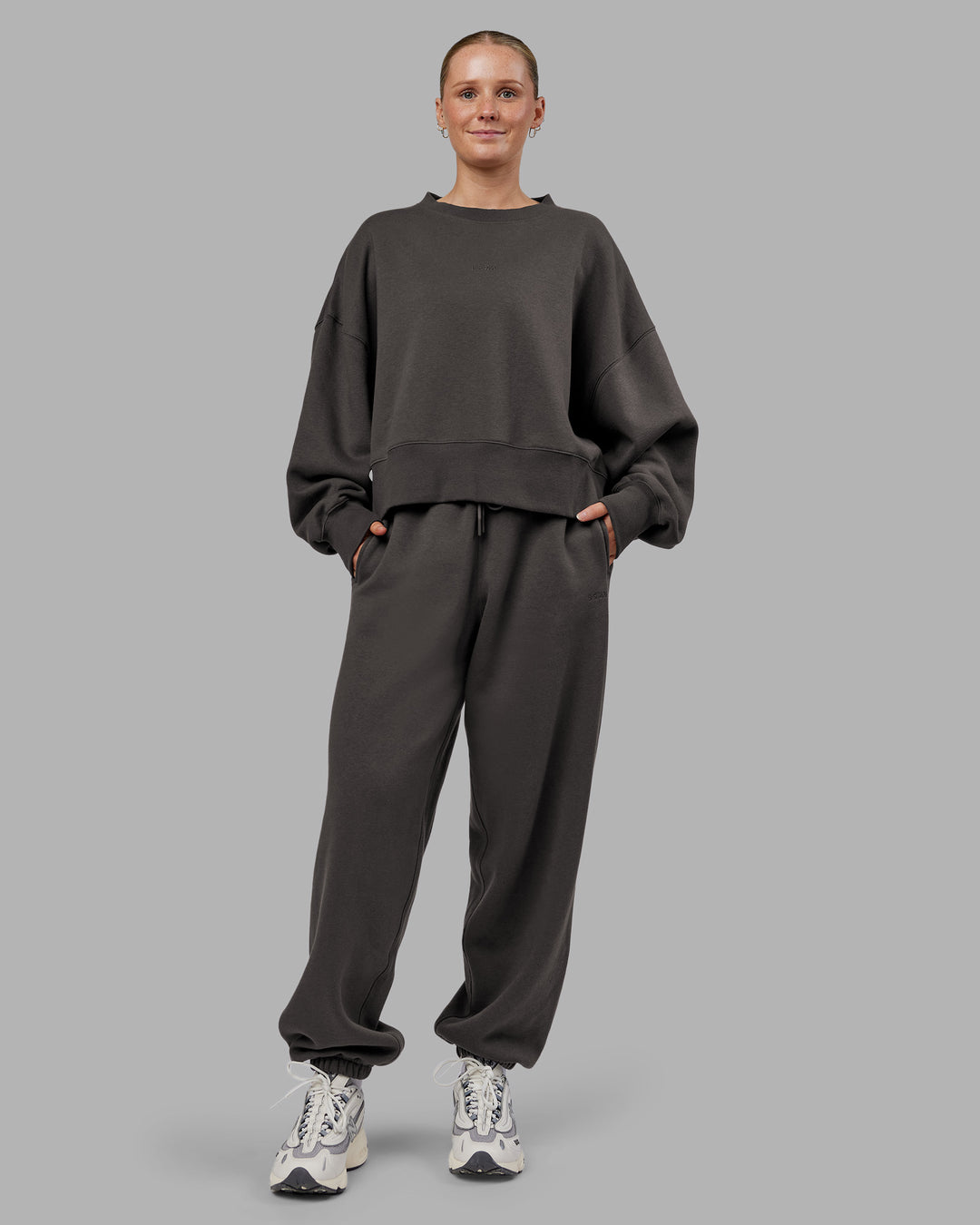 Woman wearing MVP Oversized Slouchy Fit Track Pant - Dark Storm | Model:Neve | Size:S - view 5
