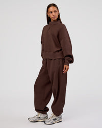 Woman wearing MVP Oversized Slouchy Fit Track Pant - Hot Chocolate | Model:Brylee | Size:S | Thumbnail Index: 4