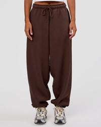 Woman wearing MVP Oversized Slouchy Fit Track Pant - Hot Chocolate | Model:Brylee | Size:S | Thumbnail Index: 5