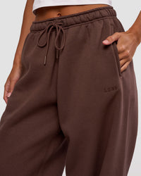 Woman wearing MVP Oversized Slouchy Fit Track Pant - Hot Chocolate | Model:Brylee | Size:S | Thumbnail Index: 2