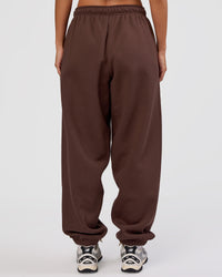 Woman wearing MVP Oversized Slouchy Fit Track Pant - Hot Chocolate | Model:Brylee | Size:S | Thumbnail Index: 3