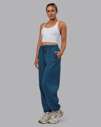 Woman wearing MVP Oversized Slouchy Fit Track Pant - Indigo | Model:Paris | Size:S | Thumbnail Index: 1