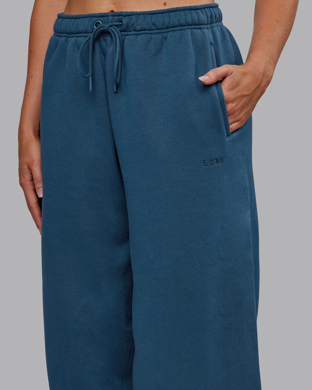 Woman wearing MVP Oversized Slouchy Fit Track Pant - Indigo | Model:Paris | Size:S - view 3
