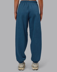 Woman wearing MVP Oversized Slouchy Fit Track Pant - Indigo | Model:Paris | Size:S | Thumbnail Index: 3
