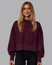 Woman wearing MVP Oversized Sweater - Cherry Lacquer | Model:Emilie | Size:S | Thumbnail Index: 1