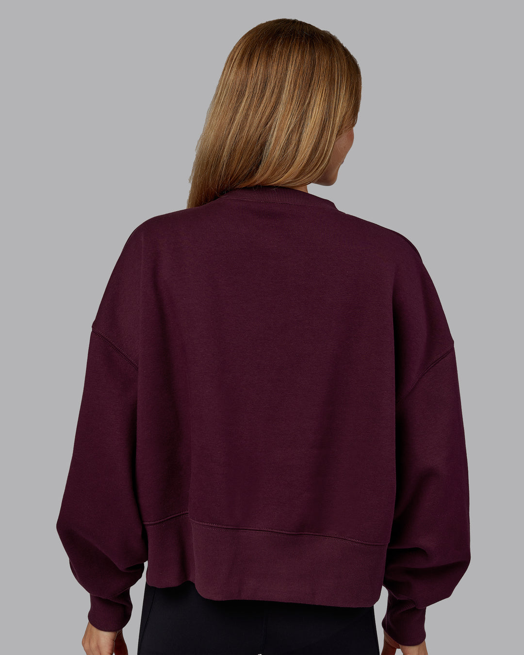 Woman wearing MVP Oversized Sweater - Cherry Lacquer | Model:Emilie | Size:S - view 3